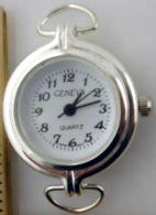 12 Silver tone loop watch faces