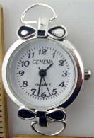 12 Silver tone loop watch faces
